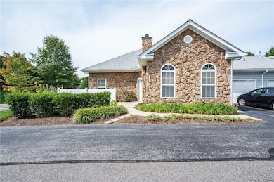 Exterior front of the home view of the paved drive