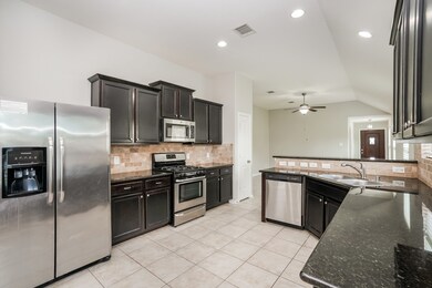 10902 Camarillo Ct, Houston, TX 77088 - photo 6