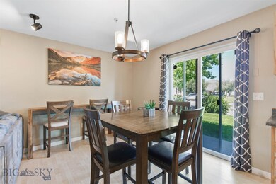 Sunny dining area with direct covered patio access