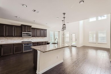 Kitchen featuring appliances with stainless steel 