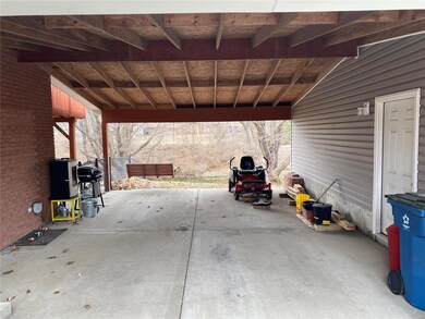 30x18 breezeway or carport. Would make a nice screened in space to entertain in.