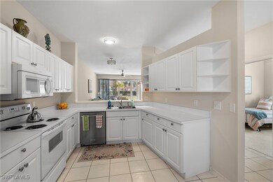 White cabinetry, and open shelves