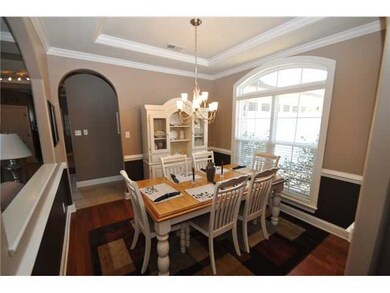 Open Dining Room with hardwood floors.