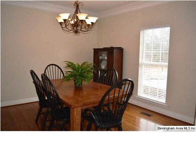 Formal Dining Room with hardwood floors