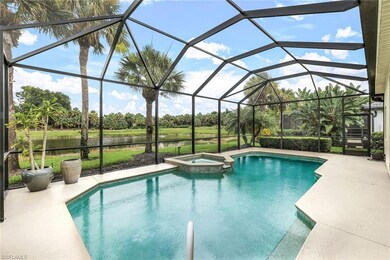 View of swimming pool with an in ground hot tub, a