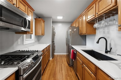 Kitchen featuring Newer Cabinets, Quartz Counterto
