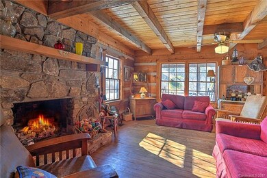 Massive rock fireplace in living room