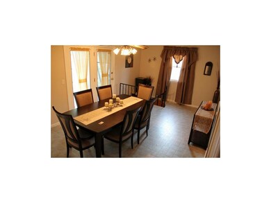 Large Formal Dining Room with Access to Basement a