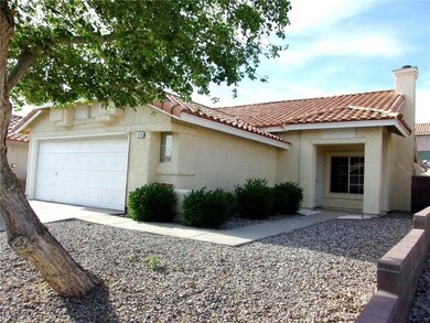 Mediterranean / spanish-style home with a tile roo