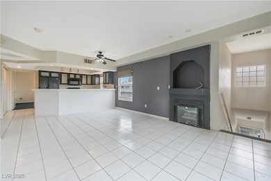 Unfurnished living room featuring visible vents, a