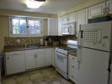 Kitchen. Newer kitchen with stone back splash and 