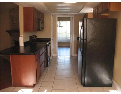 Kitchen. Electric stove and dramatic black applian