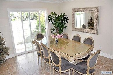 Spacious dining room with custom Tiled flooring an