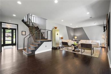 Living room with a cozy fireplace, perfect for warm evenings.