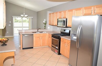 Brand new stainless appliances with a gas stove an