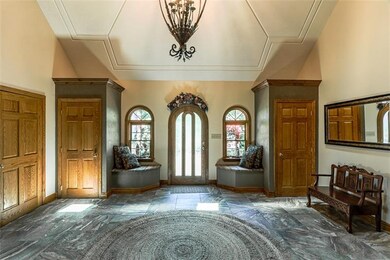 Upon entering the 2 story foyer you will see the a
