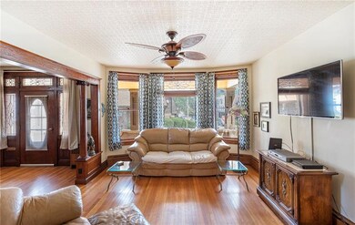Wow, what a view!  Neutral paint.  Hardwood floors