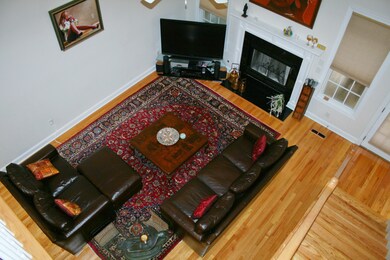Staircase overlooks living room