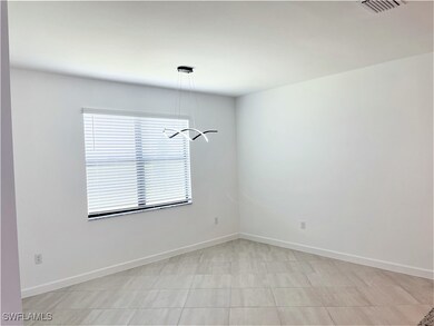 Spare room with baseboards