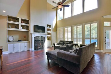 Large open windows. Large ceiling fan. Really open