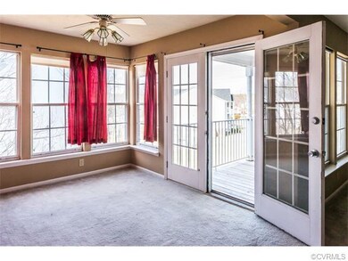 Dining Room with View of Balcony/Deck.