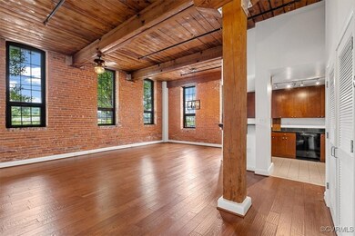 Spare room with wooden ceiling, dark wood-type flo