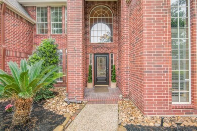 Beautiful brick elevation with majestic 2 story entry inside and out.