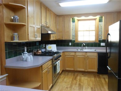 Maple Cabinets and Great Counter Work space! Refin