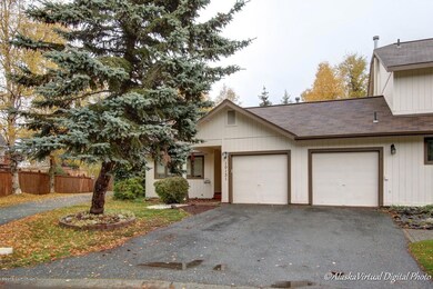 Attached Garage and Paved Driveway
