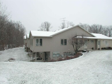 2133 Creekside Dr SW unit 51, Byron Center, MI 49315 - photo 2