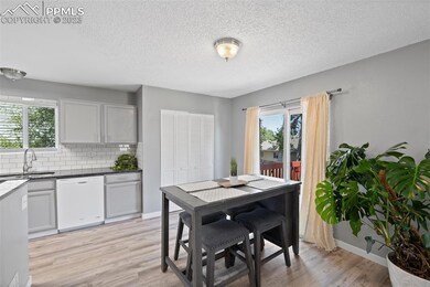 Dining area with access to deck