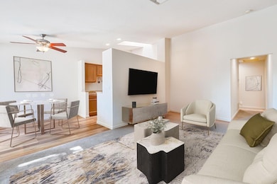 7121 Stella Ln, Unit 24, Carmichael, CA 95608 - Living room virtually staged to show open light filled floor plan