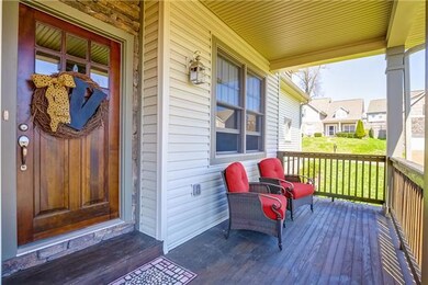 Enjoy this over-sized front porch as you enter this lovely home.  Not pictured is the extra storage space in the side entry garage, equipped with cabinets as well.