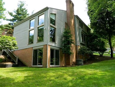 Exterior Back. Loads of light in this home     Loa