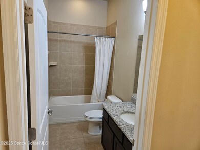 Bathroom to right