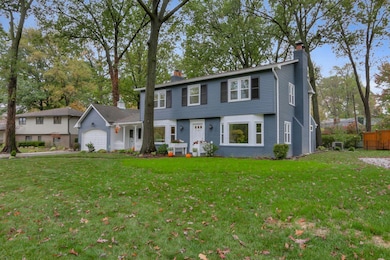 Nestled in the trees.