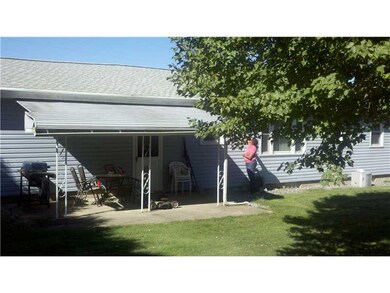 Exterior Front. Rear Patio