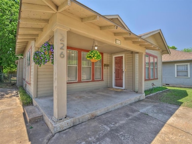 Entrance to property featuring a patio