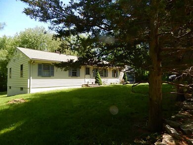 Exterior Front. Beautiful Trees border the front y