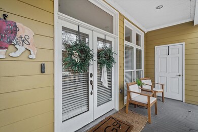 Doorway to property featuring french doors and a p