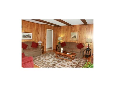 Gorgeous hardwood wall covering in Hearth Room
