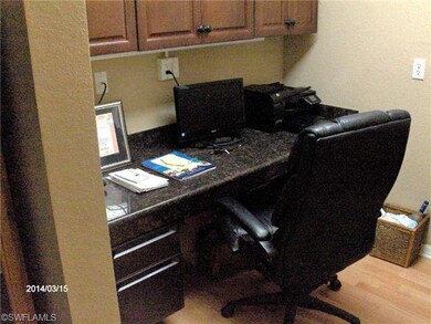 view of office from dining area. Notice  wood floo