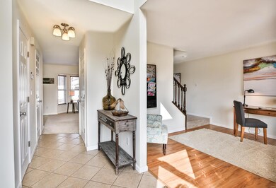 Welcoming two story 10x6 Foyer boasts a lighted ce