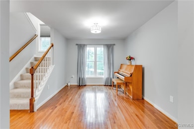Sitting room featuring plenty of natural light, li