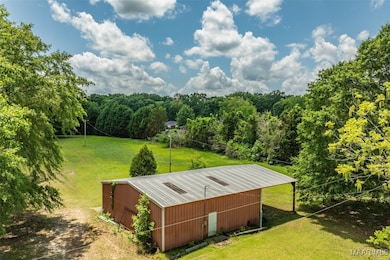 HUGE 45X60 BARN W/ ROLL UP DOOR