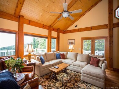 Comfortable living room with lots of windows and v