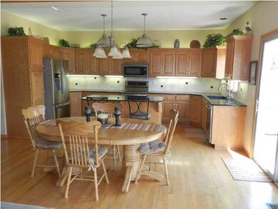 Eating Area in the Kitchen! Patio Door Leads To th
