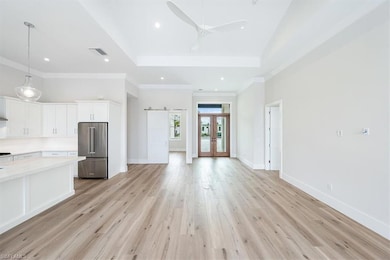 The open concept great room, kitchen, and dining a