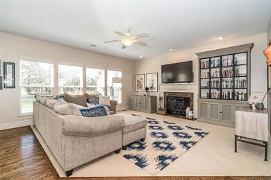 The Great Room has newer carpeting, ceiling fan, f