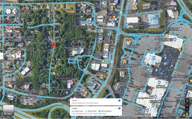 Map showing streets, transit stops, food, shopping, and Interstate I-40 proximity to the lot.